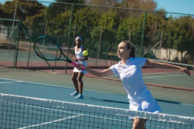 2 woman playing tennis pickleball classes La Mirada Park Los Angeles