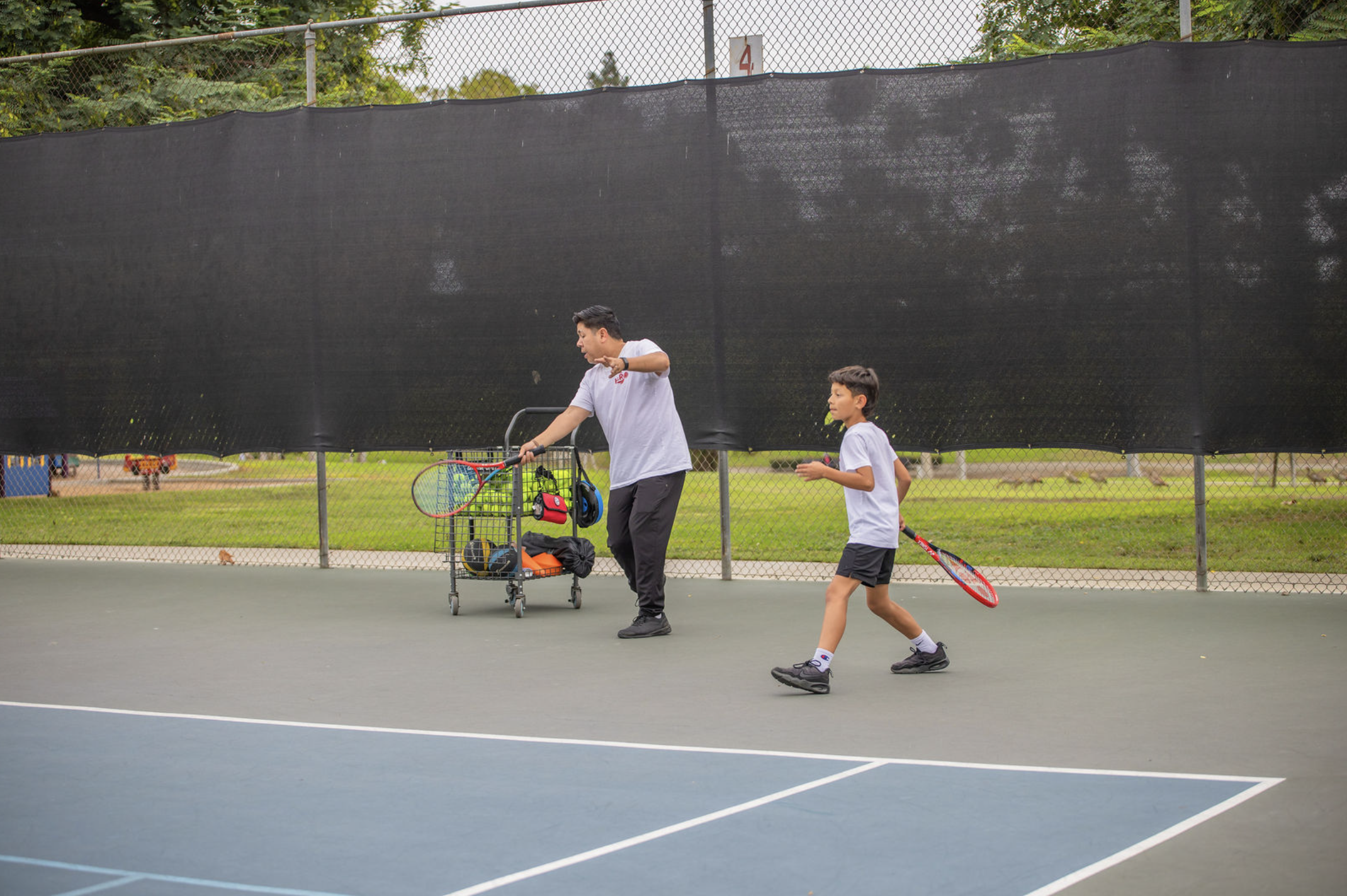 randy-tennis-coach-la-mirada-teaching-forehand